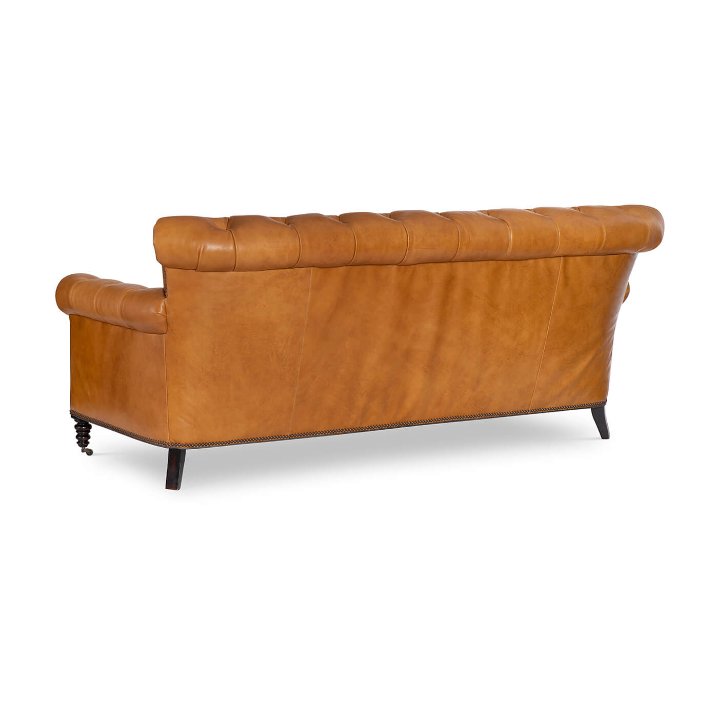 Brown tufted leather sofa, back view, showcasing full length.