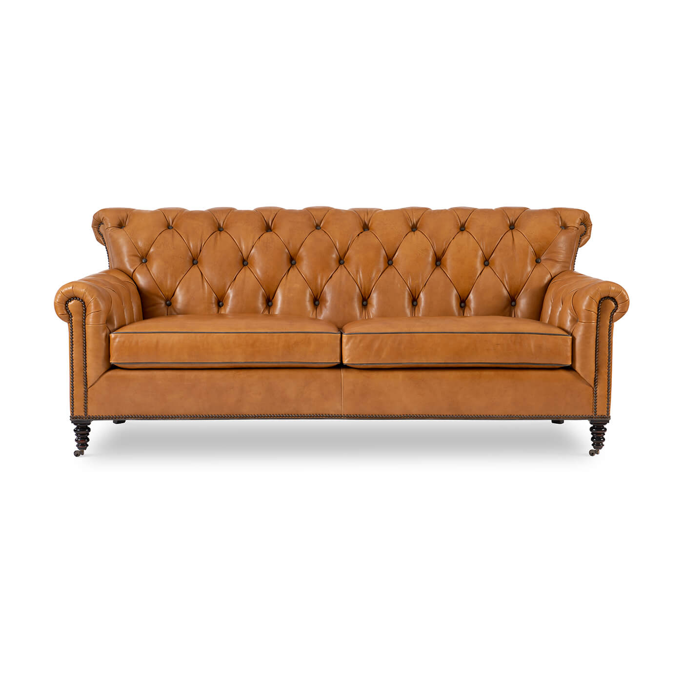 Brown tufted leather sofa, straight front view, classic style.