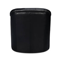 Classic tufted black leather armchair, rear view.