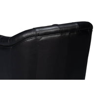 Classic leather armchair, back detail close-up.