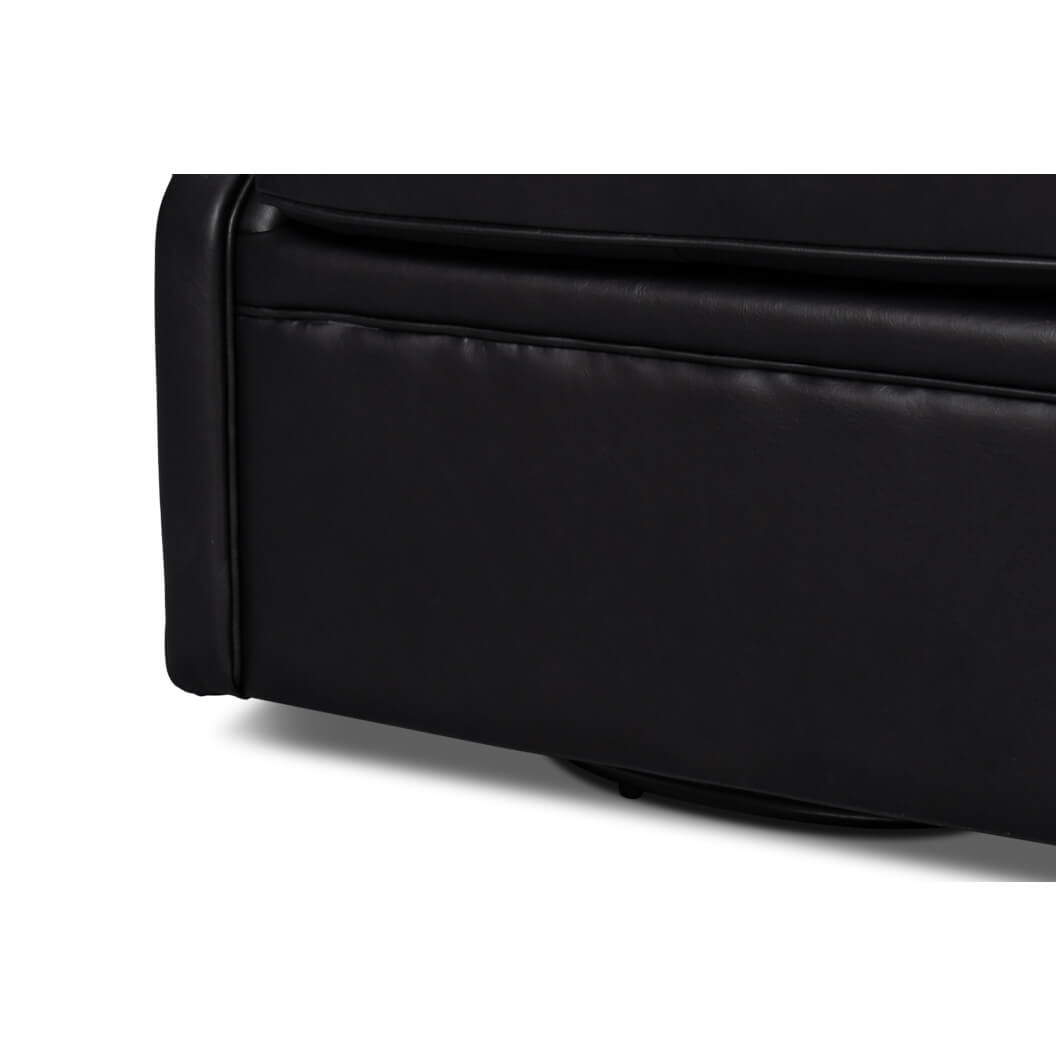 Base of black leather armchair, close-up detail.