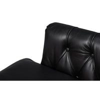 Close-up of classic armchair tufted leather armrest.