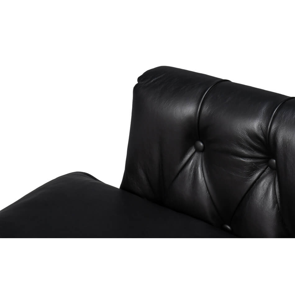 Close-up of classic armchair tufted leather armrest.
