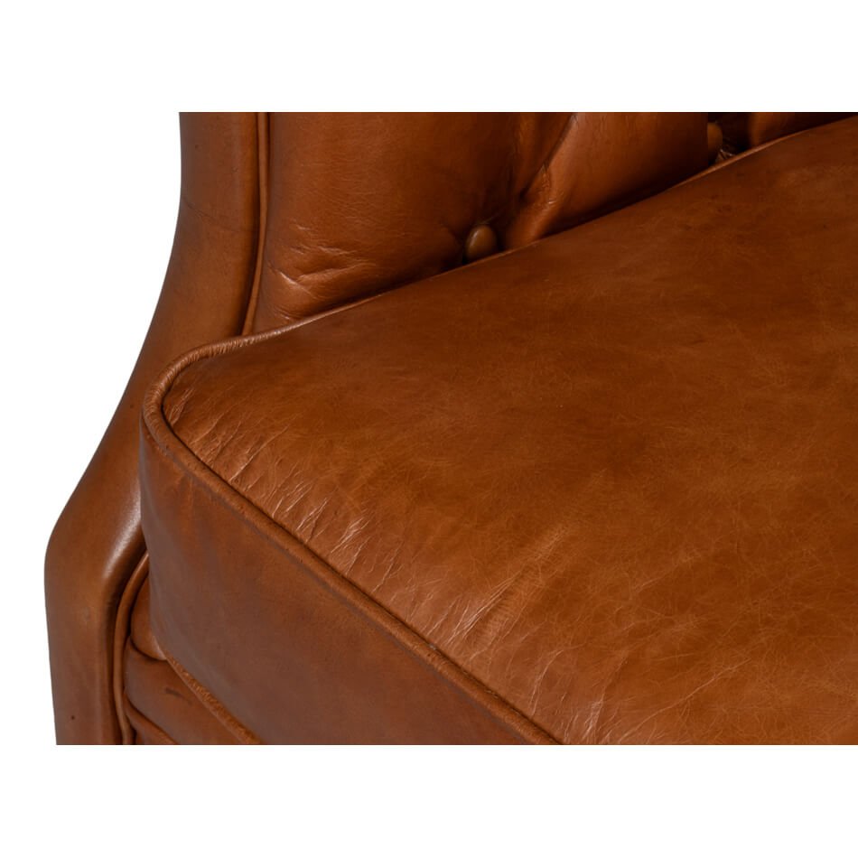 Brown leather armchair, close-up of seat cushion, leather texture.