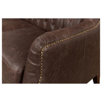 Detail of armrest with nailhead trim, tufted love seat.