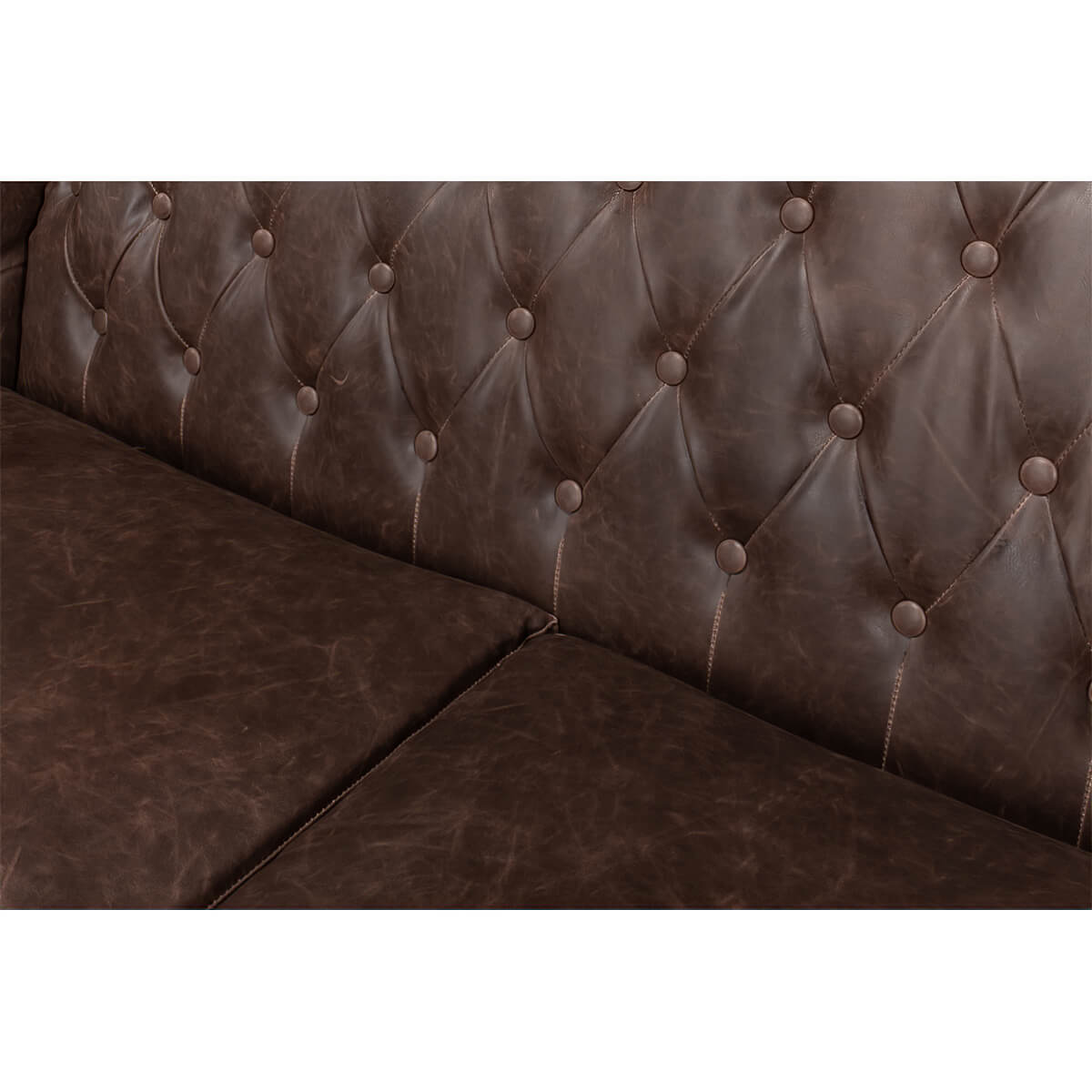 Backrest close-up with tufting, brown love seat.