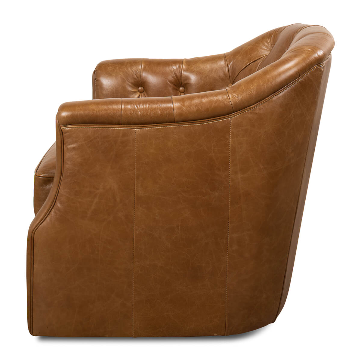 Brown tufted armchair, side profile showing curvature.