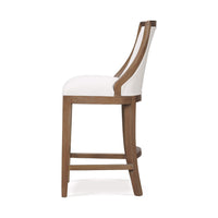 Side view of white upholstered counter stool, wooden frame.