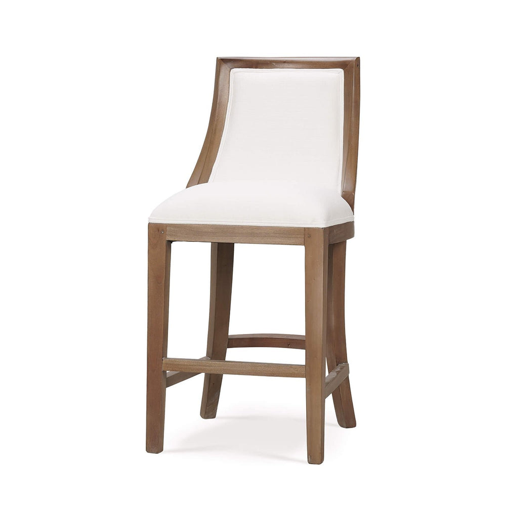 Wooden counter stool with white upholstery, three-quarter view.