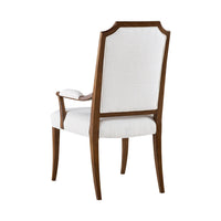 Back view of classic upholstered dining armchair.