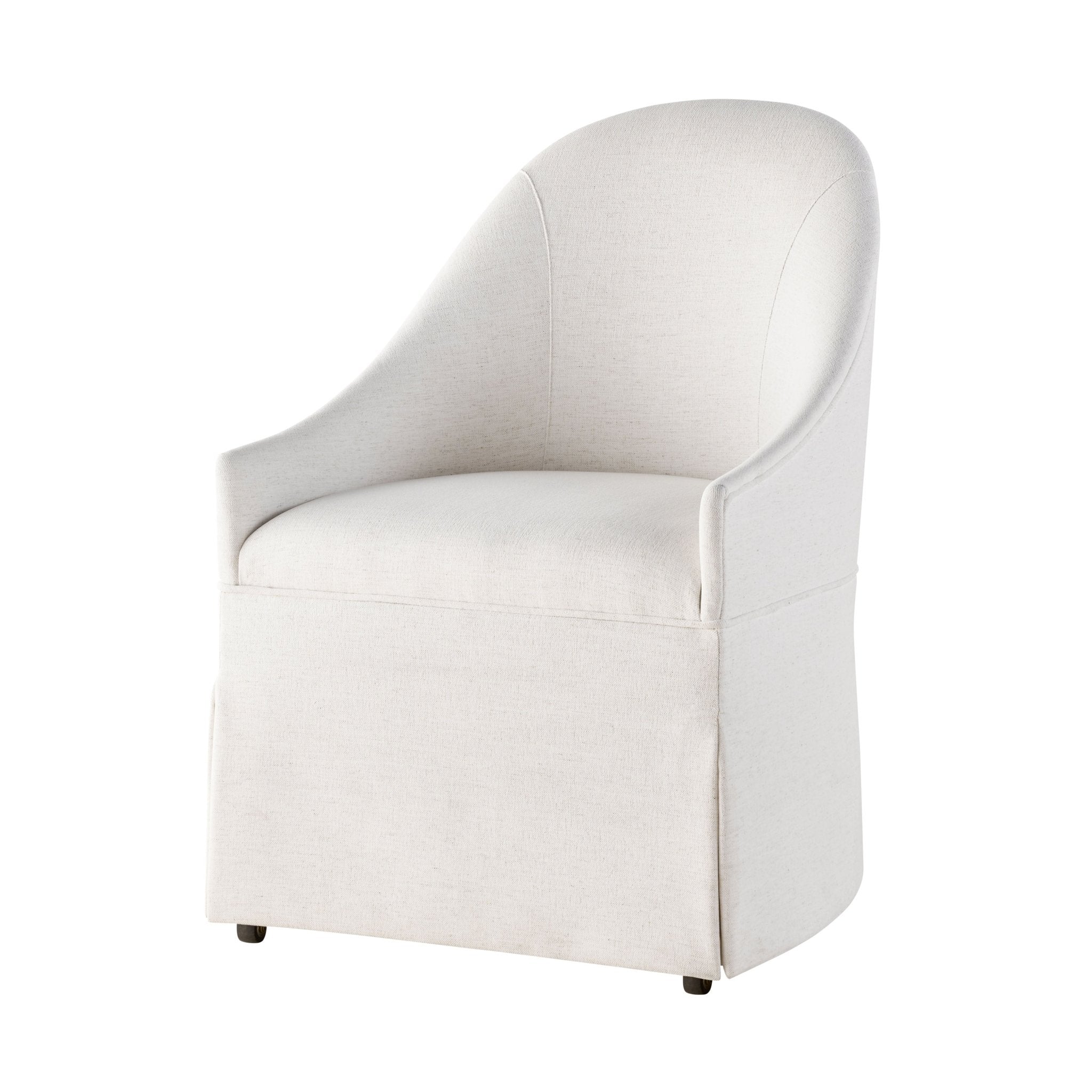 White skirted dining chair angled view against white background.