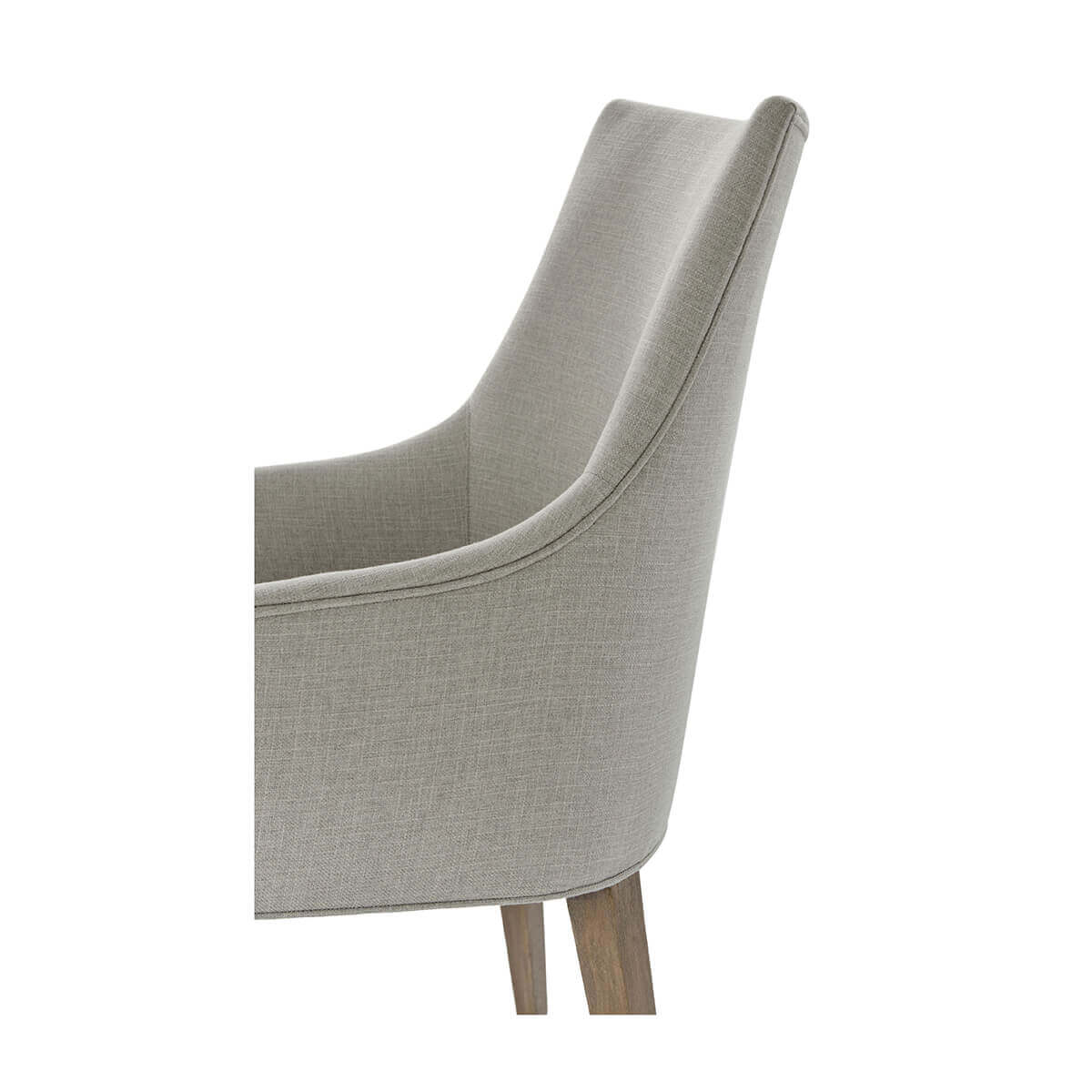 Classic upholstered armchair, close-up, detailed stitching.