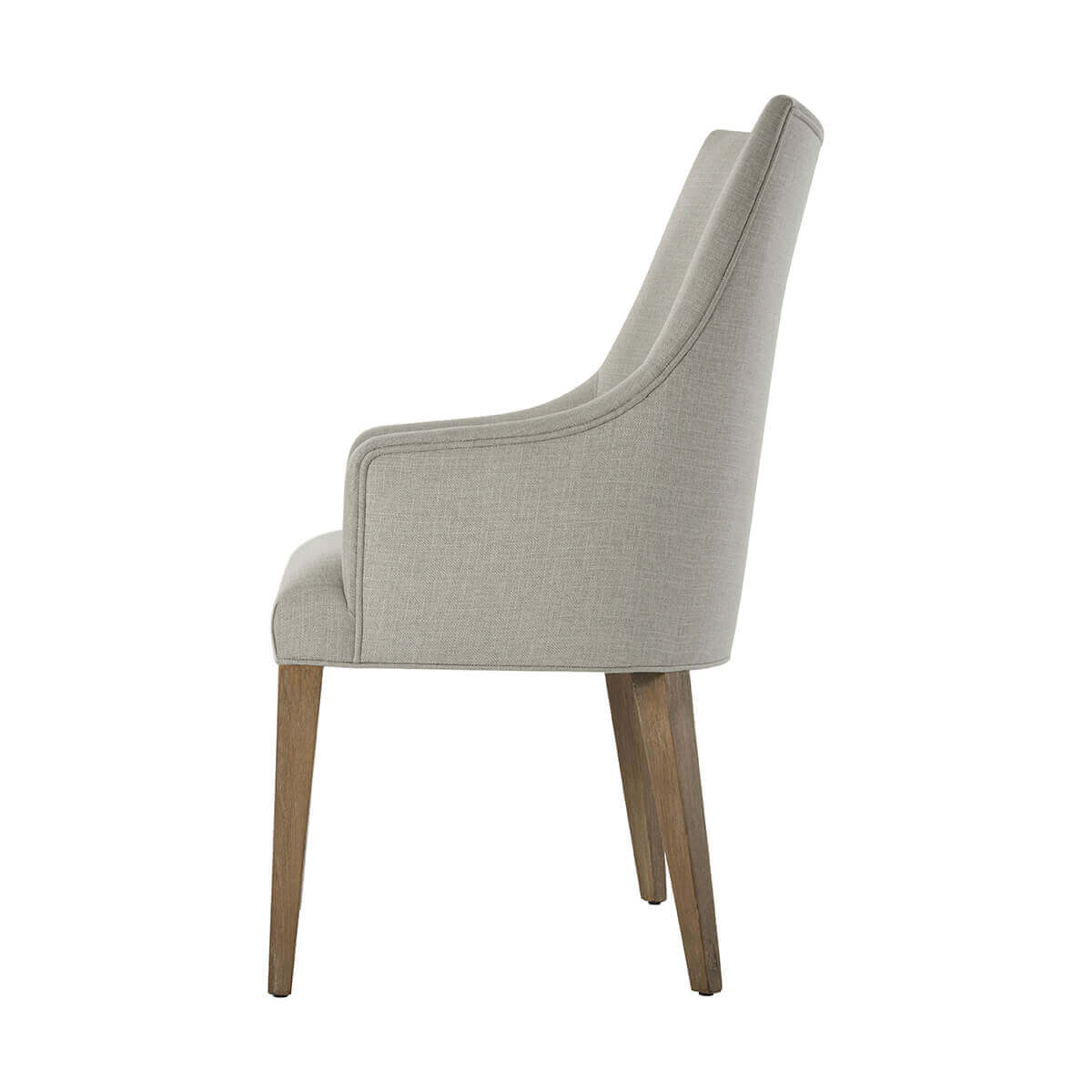 Classic upholstered armchair, side view, elegant profile.