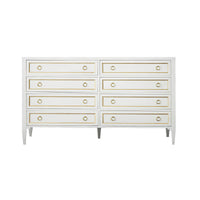 Frontal view of white dresser, gold detailing.