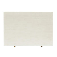 Top view of rustic white side table surface.
