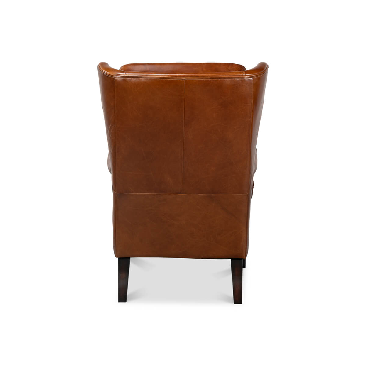 Back view of wingback leather chair detailing stitching.