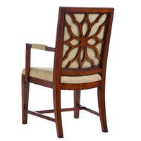Back view of classical dining chair with decorative pattern.