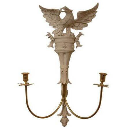 Antique-style eagle sconce with white finish and candles.