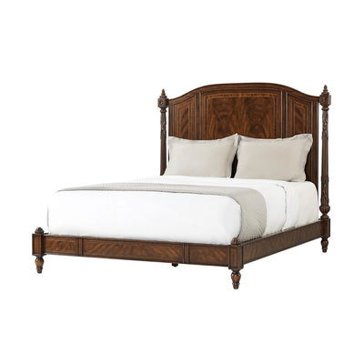 Classic queen size bed with pillows, front view.