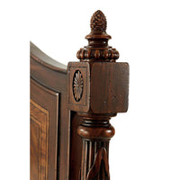 Classical queen size bed, carved wood post detail.