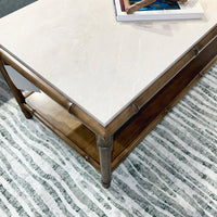 Close-up of bamboo coffee table corner and tabletop.
