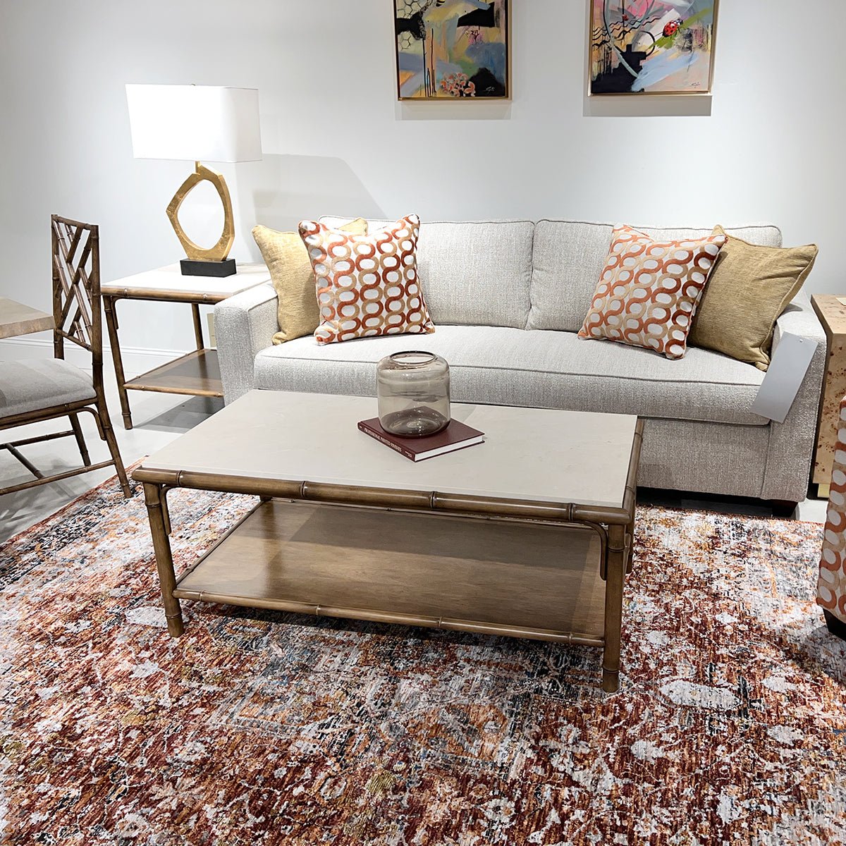 Living room with bamboo coffee table and furniture set.