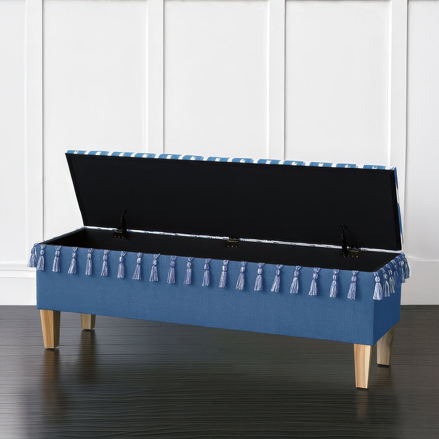Open coastal blue bench showing storage compartment inside.