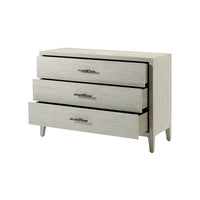 Coastal Breeze dresser with partially opened drawers.
