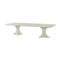 Extended white dining table with double pedestal base, isolated.