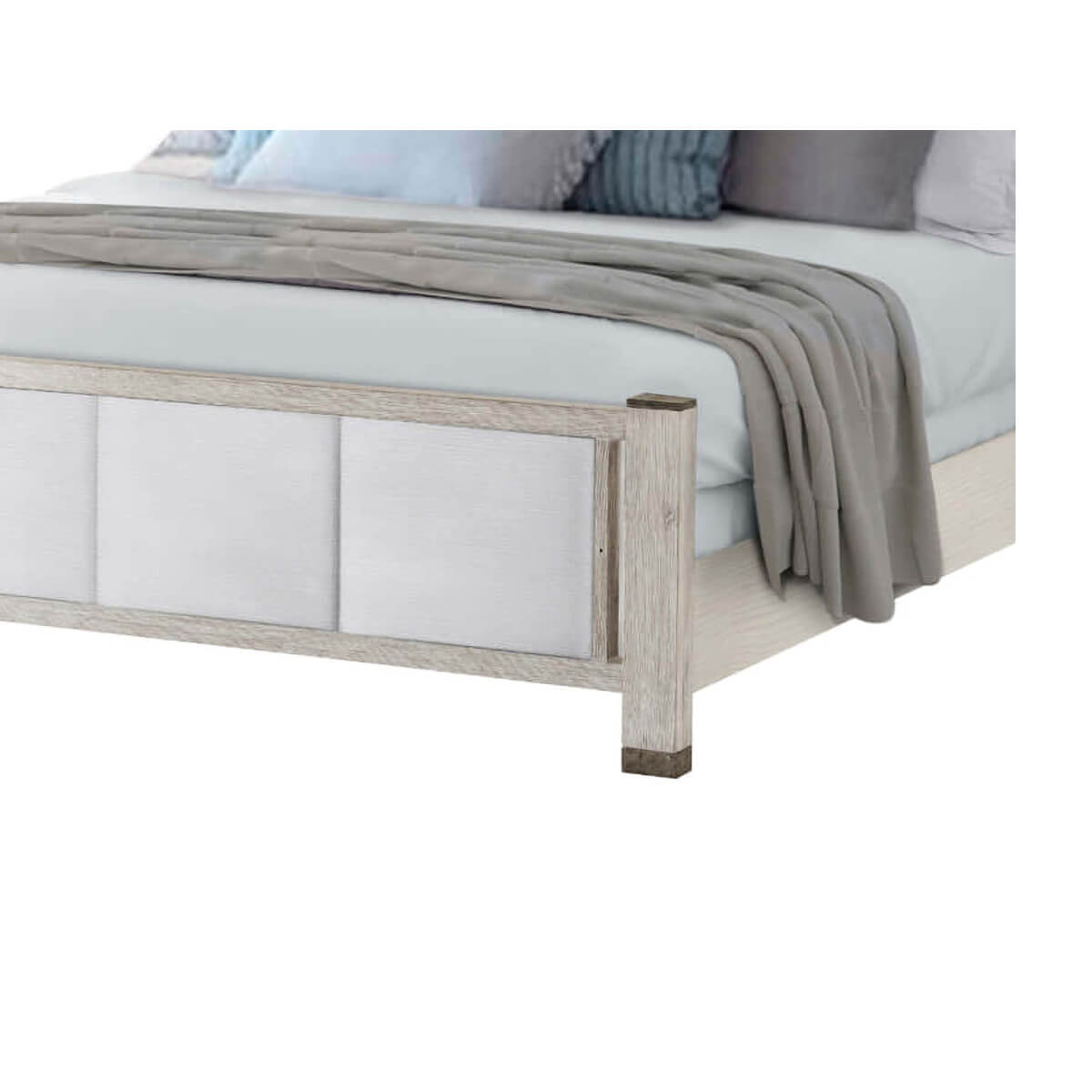 Close-up of bed footboard with light wood finish.