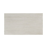 Top view of nightstand, textured wood surface.