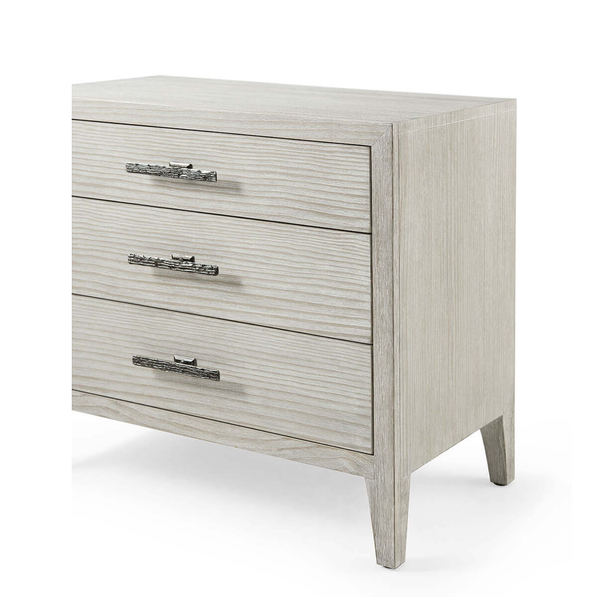 Nightstand angled view, detailed drawer handles, light wood finish.