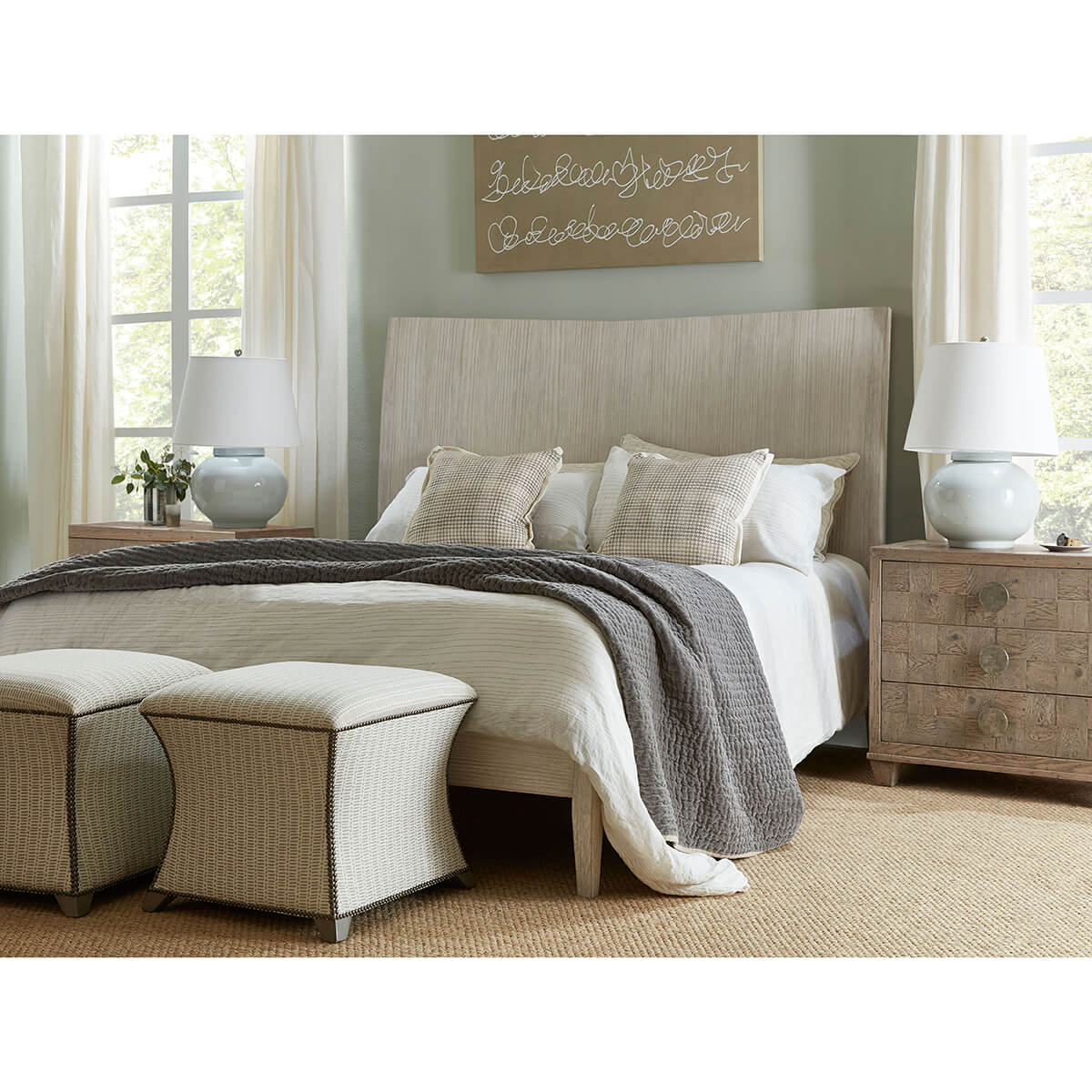 Styled bedroom with bed and matching furniture.