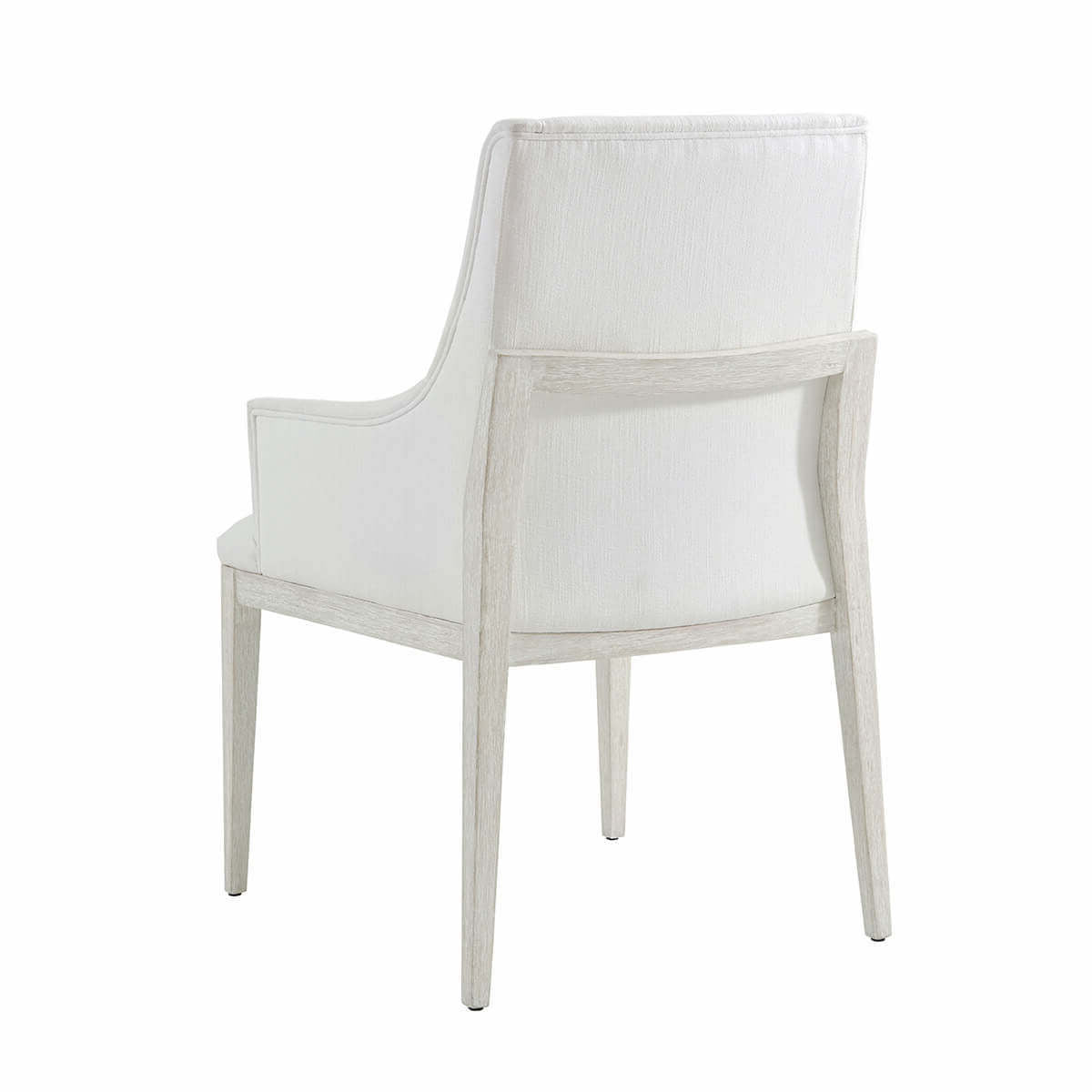 White upholstered armchair, back view, dining chair.