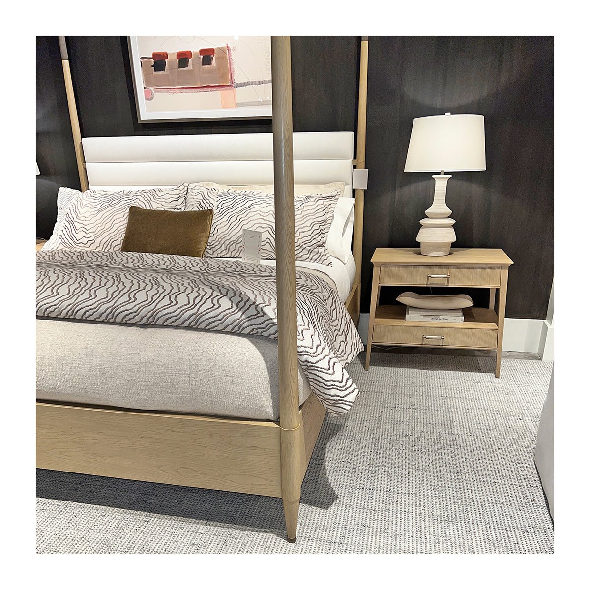 Coastal mid-century oak bed, close-up, nightstand, and lamp.