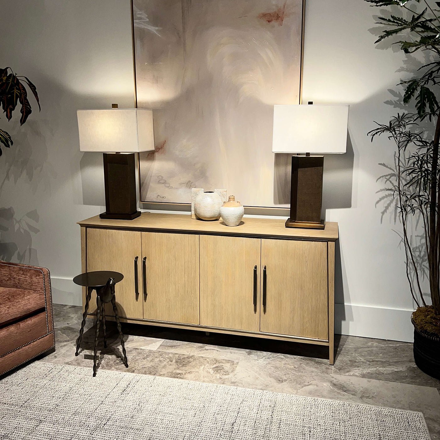 Oak sideboard styled in a living room setting.