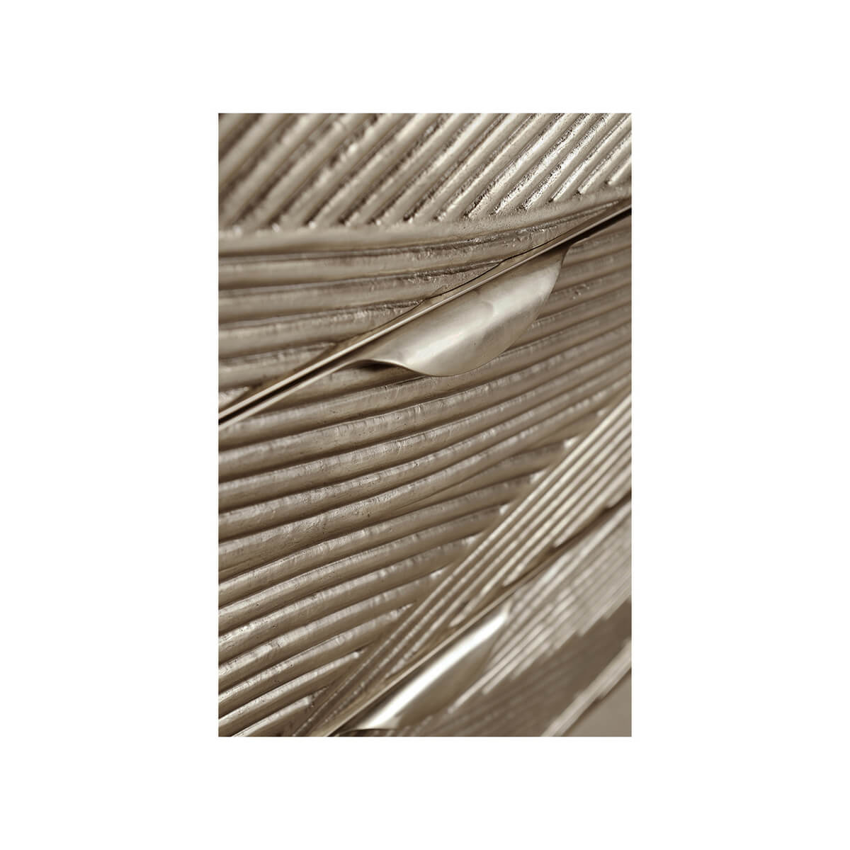 Close-up of textural detail on dresser drawer.