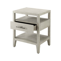 Coastal nightstand with partially open drawer.