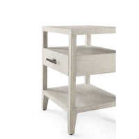 Angled side view of coastal nightstand and open drawer.