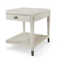 Coastal side table angled view showing legs and shelf.