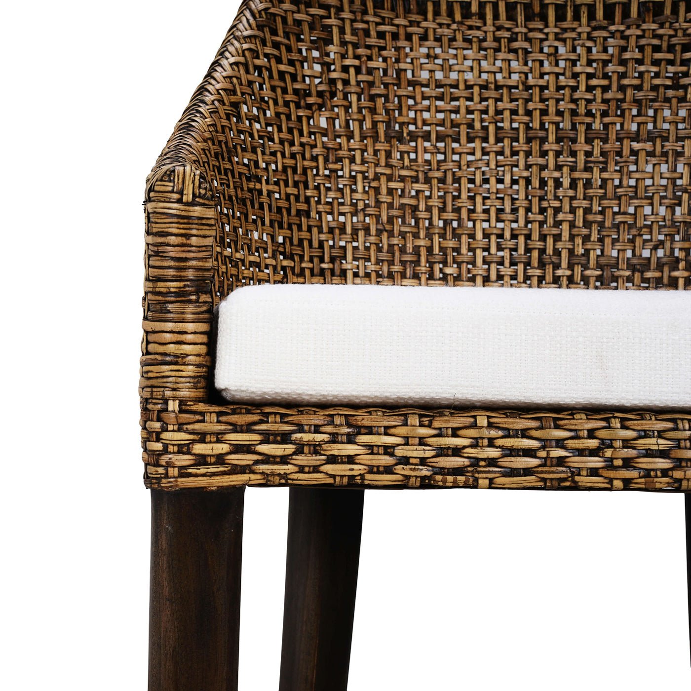 Front corner of rattan barstool with cushion detail.
