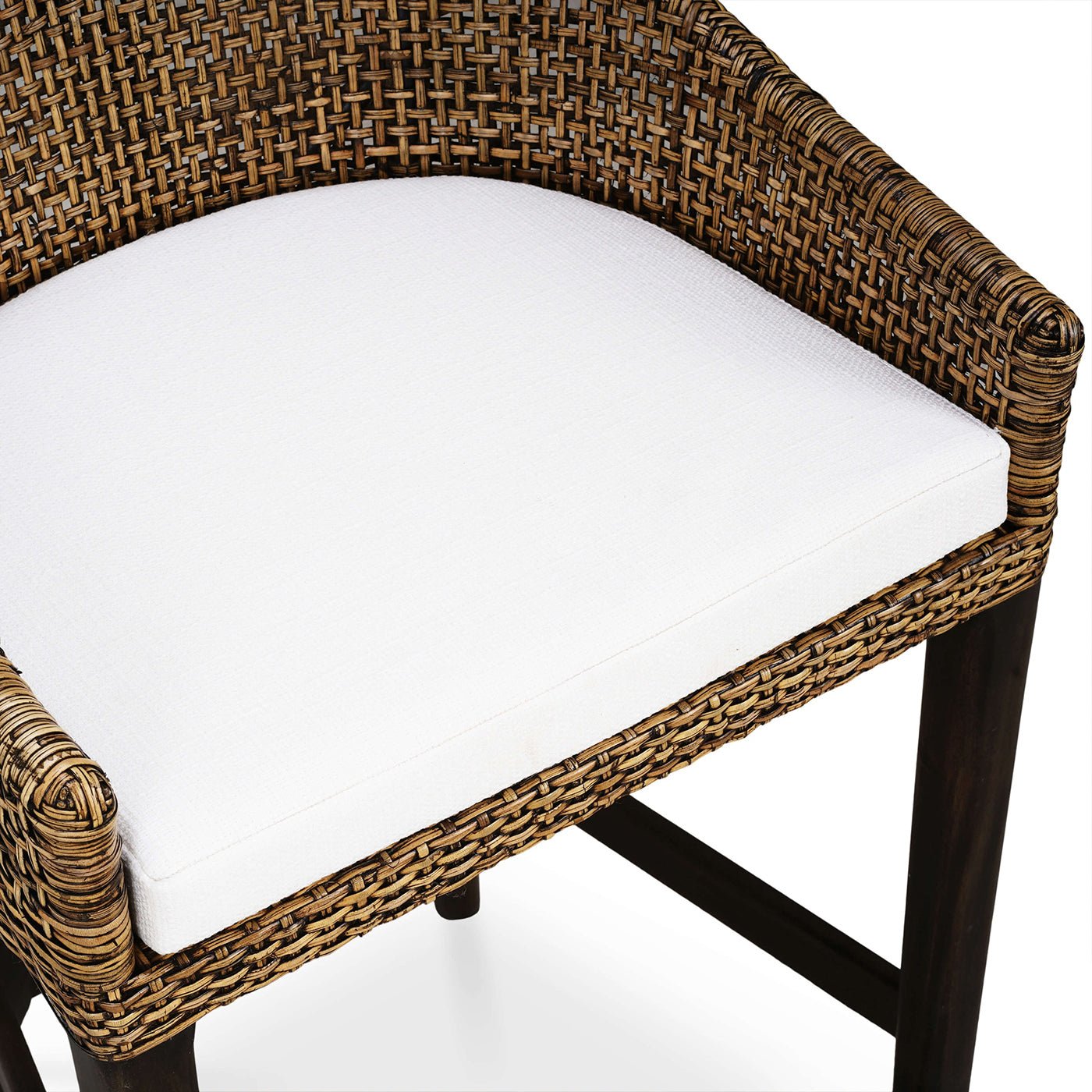Top view of rattan stool cushion and seating area.