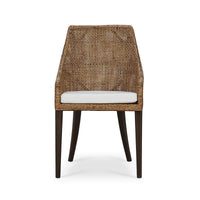 Front view of coastal rattan dining chair with cushion.