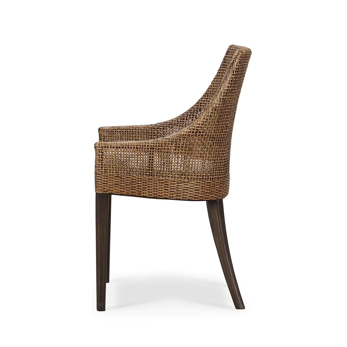 Side profile of coastal rattan dining chair.
