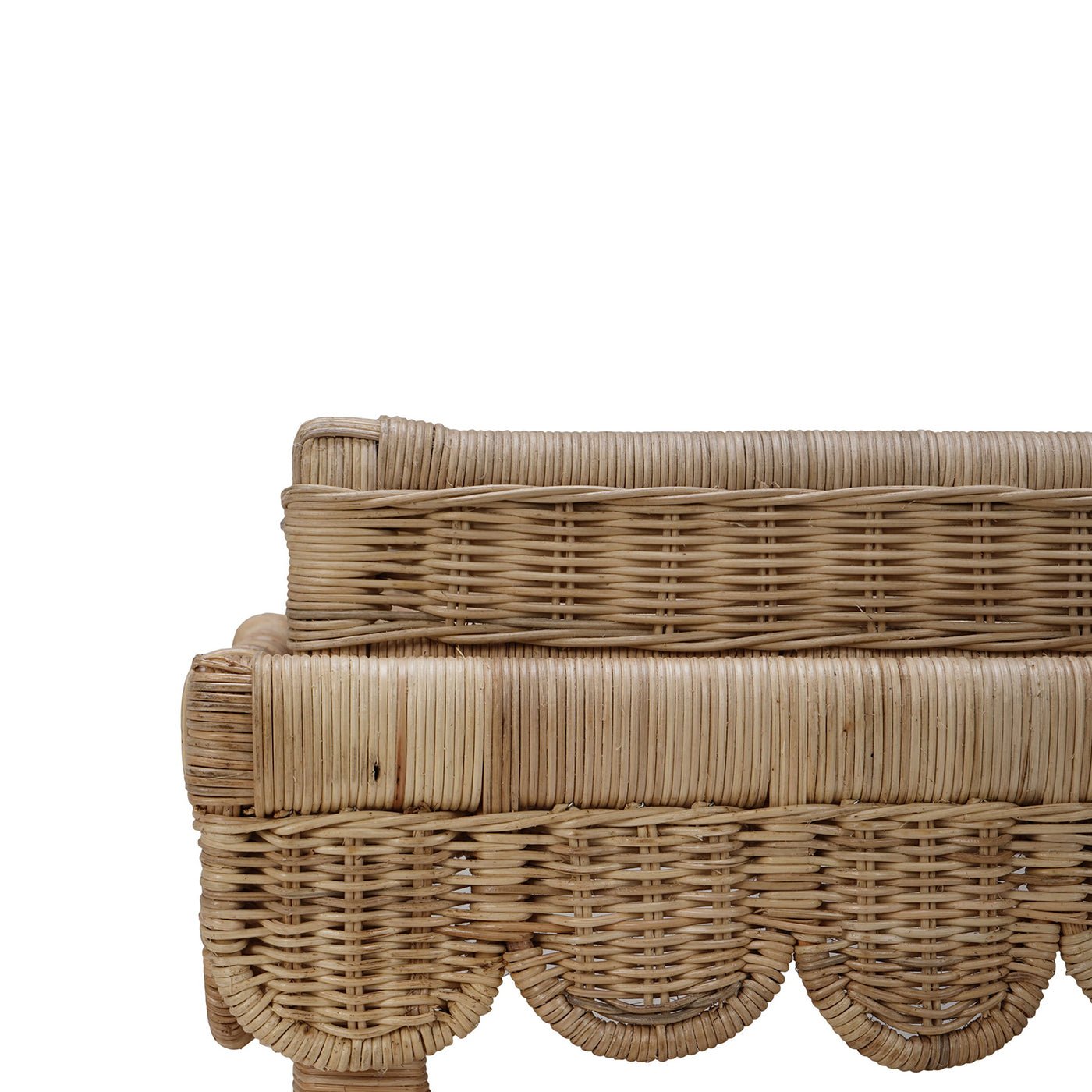 Close-up of rattan table scalloped detail.