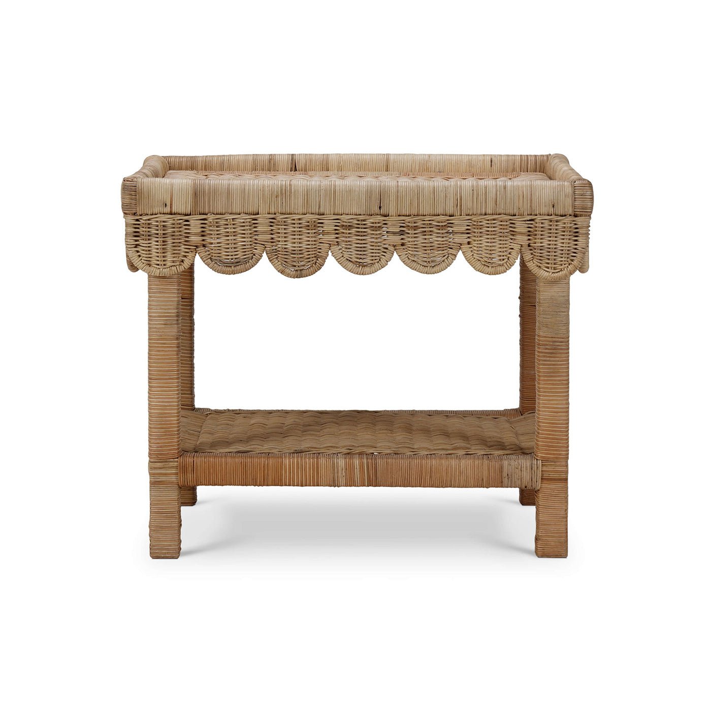 Rattan table with scalloped edge, straight back view.