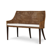 Angled view of coastal rattan settee showcasing design.