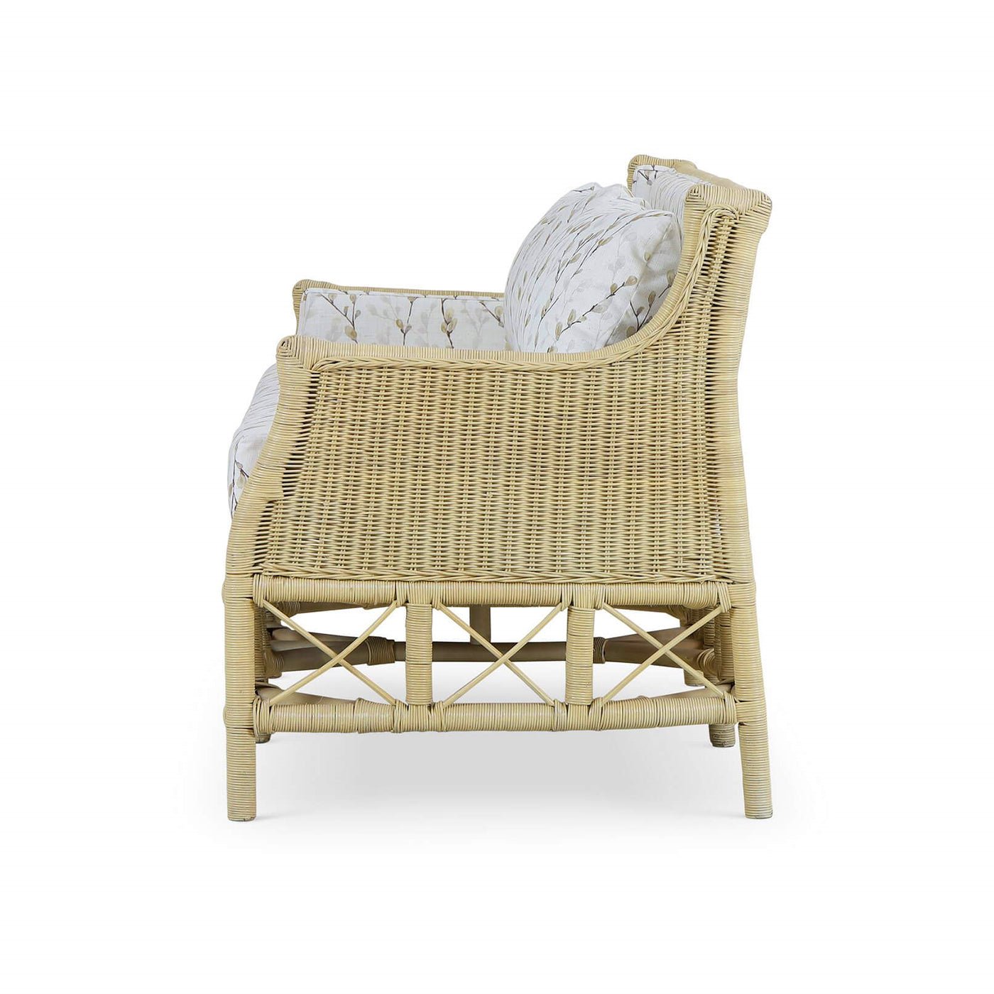 Side profile of rattan settee, wicker detail focus.