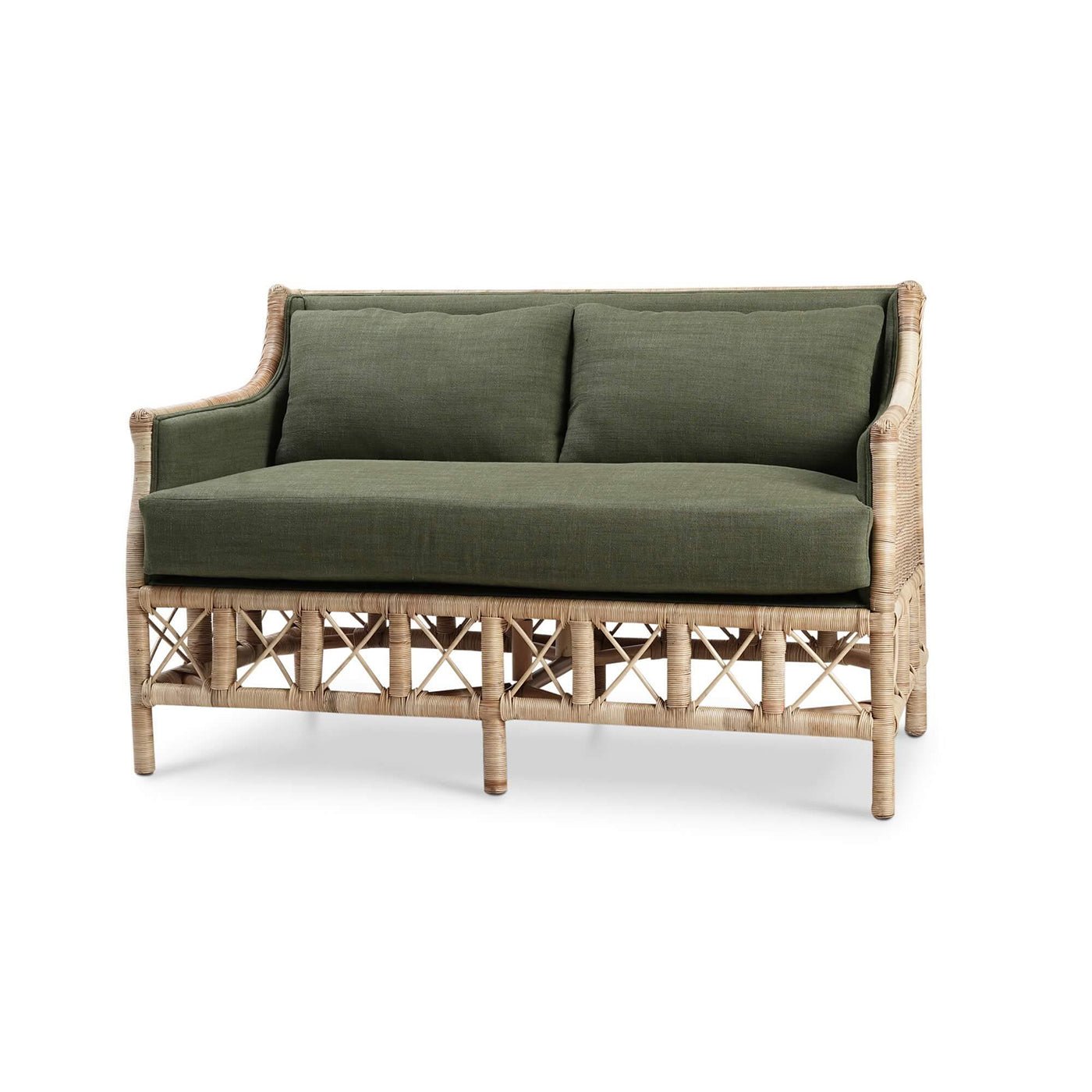 Rattan settee with green cushions, angled view.