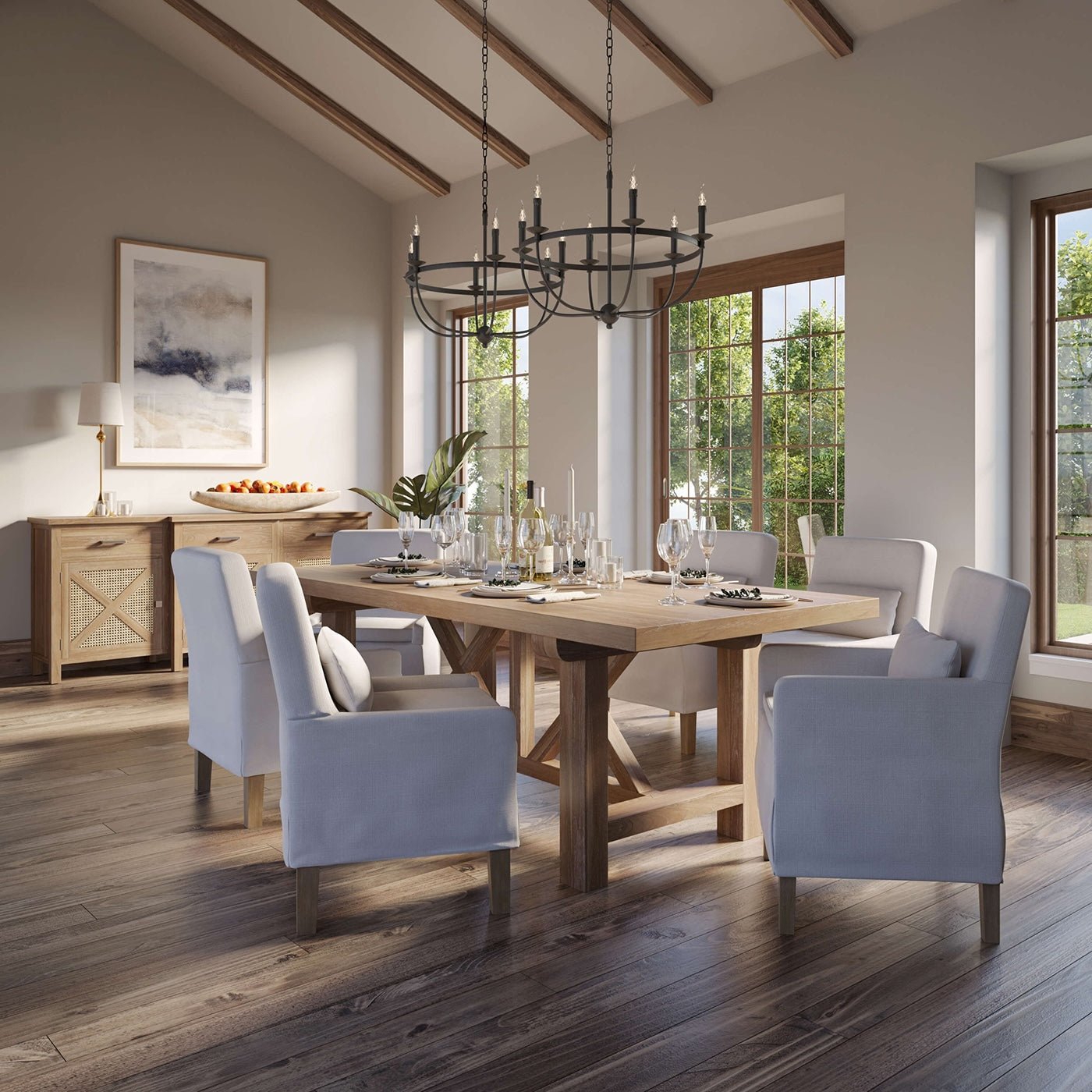 Dining room with armchairs around a wooden table.